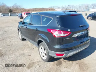 2013 Ford Escape SEL with VIN 1FMCU9HX5DUC58726, listed as a IAAI auction lot 41766493 with 219,093 mi miles. Bid and sale history available at carsss.com. Image 3.