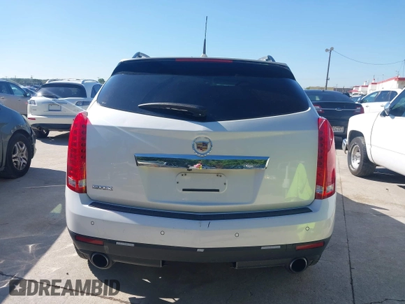2011 Cadillac SRX Premium Collection z VIN 3GYFNCEYXBS579760, wystawiony jako IAAI lot #42238707 z przebiegiem Nie podano mil oraz . Historia ofert i sprzedaży dostępna na DreamBid. Obrazek 15.