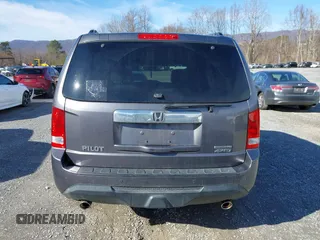2014 Honda Pilot Touring with VIN 5FNYF4H95EB019048, listed as a IAAI auction lot 41526958 with 172,252 mi miles and . Bid and sale history available at DreamBid. Image 16.