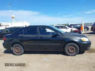 2004 Toyota Corolla CE with VIN JTDBR32E142041255, listed as a IAAI auction lot 41807159 with 211,905 mi miles and . Bid and sale history available at DreamBid. Image 13.