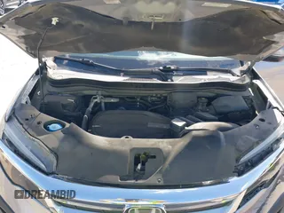 2020 Honda Pilot EX-L with VIN 5FNYF5H46LB004744, listed as a IAAI auction lot 42095298 with 76,159 mi miles and . Bid and sale history available at DreamBid. Image 10.