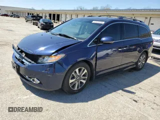 2014 Honda Odyssey Touring with VIN 5FNRL5H96EB068651, listed as a Copart auction lot 51649735 with 157,213 mi miles and Salvage title. Bid and sale history available at DreamBid. Image 1.