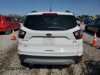 2018 Ford Escape SE z VIN 1FMCU9GD5JUD07359, wystawiony jako Copart lot #55331255 z przebiegiem 142 502 mil mil oraz Czysty tytuł • Clean title. Historia ofert i sprzedaży dostępna na DreamBid. Obrazek 6.