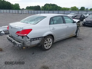 2010 Toyota Avalon XL with VIN 4T1BK3DB6AU369581, listed as a IAAI auction lot 42159063 with 137,996 mi miles and . Bid and sale history available at carsss.com. Image 4.