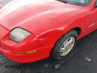 1999 Pontiac Sunfire SE z VIN 1G2JB5248X7528290, wystawiony jako IAAI lot #42252324 z przebiegiem 156 758 mil mil oraz . Historia ofert i sprzedaży dostępna na DreamBid. Obrazek 6.