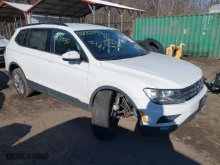 2018 Volkswagen Tiguan S with VIN 3VV1B7AX1JM015870, listed as a IAAI auction lot 41632032 with 82,578 mi miles. Bid and sale history available at carsss.com. Image 1.