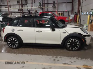 2019 MINI Hardtop 4 Door Cooper S with VIN WMWXU3C5XK2H88000, listed as a IAAI auction lot 41903504 with 60,245 mi miles and . Bid and sale history available at DreamBid. Image 14.