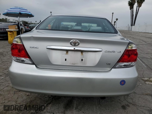 2005 Toyota Camry LE with VIN 4T1BF32KX5U601192, listed as a Copart auction lot 55365485 with 153,251 mi miles and Salvage Title. Bid and sale history available at DreamBid. Image 6.