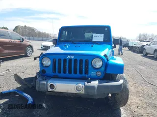 2015 Jeep Wrangler Unlimited Sahara z VIN 1C4HJWEG5FL650829, wystawiony jako IAAI lot #41824739 z przebiegiem 127 719 mil mil oraz . Historia ofert i sprzedaży dostępna na DreamBid. Obrazek 12.