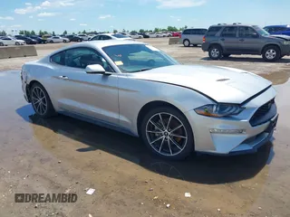 2018 Ford Mustang EcoBoost z VIN 1FA6P8THXJ5128830, wystawiony jako IAAI lot #42192673 z przebiegiem 58 817 mil mil oraz . Historia ofert i sprzedaży dostępna na DreamBid. Obrazek 1.