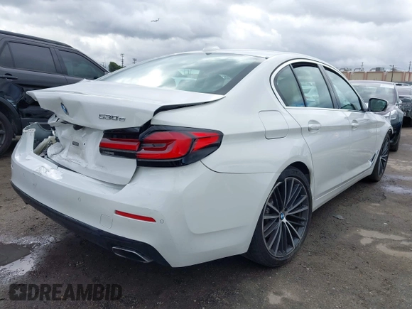 2021 BMW 5 Series 530e with VIN WBA13AG0XMCG10032, listed as a IAAI auction lot 41788724 with 29,693 mi miles and . Bid and sale history available at carsss.com. Image 4.