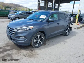 2016 Hyundai Tucson Sport with VIN KM8J33A2XGU022633, listed as a IAAI auction lot 41990348 with 73,395 mi miles. Bid and sale history available at carsss.com. Image 2.