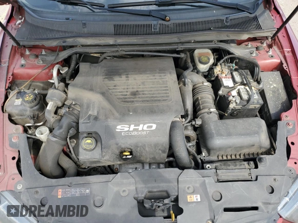 2015 Ford Taurus SHO z VIN 1FAHP2KT0FG182838, wystawiony jako Copart lot #53077535 z przebiegiem 135 857 mil mil oraz Szkoda całkowita • Salvage title. Historia ofert i sprzedaży dostępna na DreamBid. Obrazek 11.