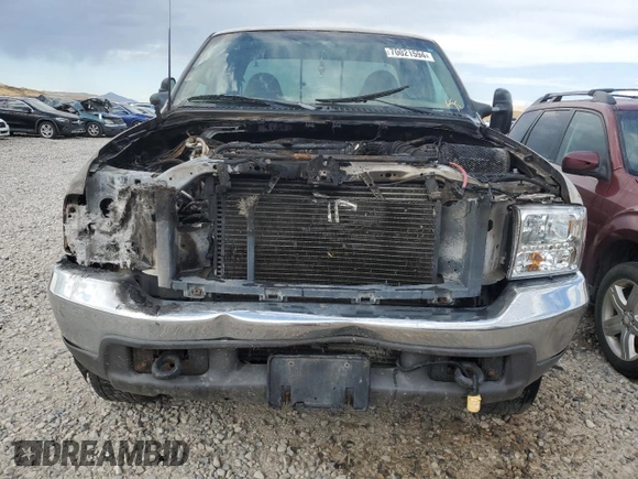 1999 Ford F-250 XL with VIN 1FTNX21F8XEE00658, listed as a Copart auction lot 70021594 with 218,084 mi miles and Non Repairable. Bid and sale history available at DreamBid. Image 5.