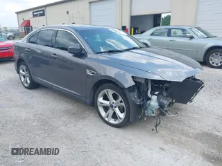 2011 Ford Taurus SHO z VIN 1FAHP2KT3BG144336, wystawiony jako IAAI lot #42612624 z przebiegiem 201 182 mil mil oraz . Historia ofert i sprzedaży dostępna na DreamBid. Obrazek 1.