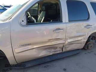 2007 GMC Yukon SLE with VIN 1GKFK130X7J131757, listed as a IAAI auction lot 41237779 with 156,148 mi miles. Bid and sale history available at carsss.com. Image 12.