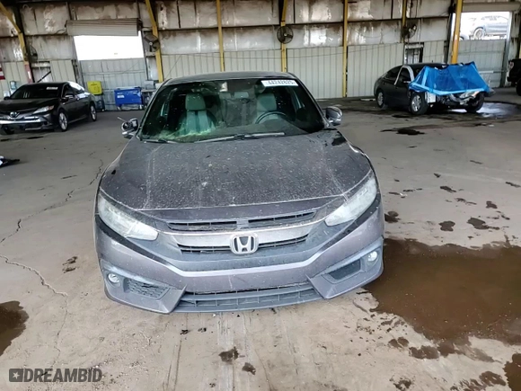 2016 Honda Civic Coupe Touring with VIN 2HGFC3B93GH351281, listed as a Copart auction lot 44242625 with 131,825 mi miles and Salvage Title. Bid and sale history available at carsss.com. Image 10.