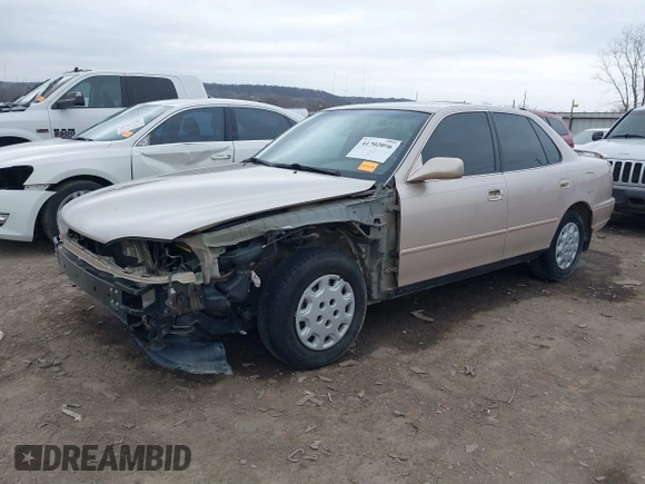 1996 Toyota Camry DX with VIN 4T1BG12K8TU738565, listed as a IAAI auction lot 41702096 with 100,587 mi miles. Bid and sale history available at carsss.com. Image 21.