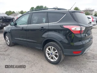 2017 Ford Escape SE with VIN 1FMCU9GD0HUC58128, listed as a IAAI auction lot 42078045 with 125,503 mi miles. Bid and sale history available at carsss.com. Image 3.