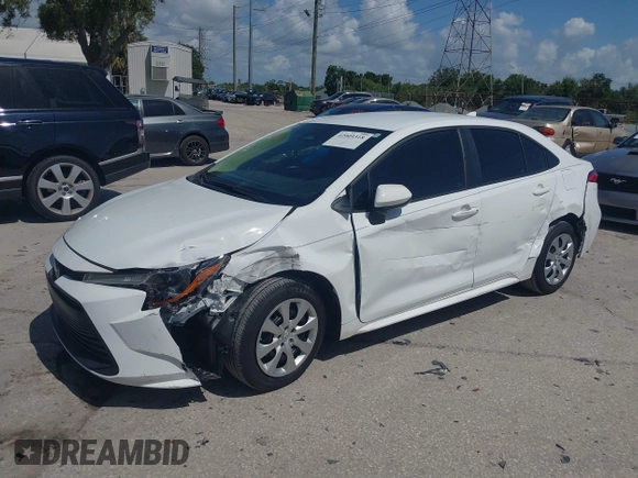 2023 Toyota Corolla LE with VIN 5YFB4MDE1PP058810, listed as a IAAI auction lot 42009318 with 10,950 mi miles and . Bid and sale history available at carsss.com. Image 2.