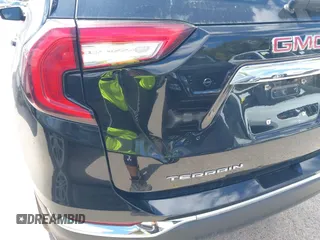 2023 GMC Terrain SLT z VIN 3GKALPEG4PL183995, wystawiony jako IAAI lot #40222049 z przebiegiem 18 875 mil mil oraz . Historia ofert i sprzedaży dostępna na DreamBid. Obrazek 6.