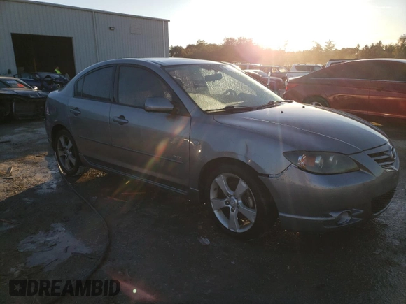 2006 Mazda 3 s with VIN JM1BK324461504512, listed as a Copart auction lot 80015434 with 130,797 mi miles and Salvage Title. Bid and sale history available at DreamBid. Image 4.