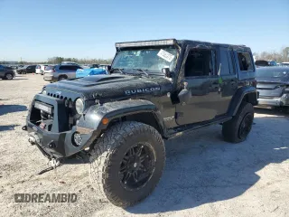 2015 Jeep Wrangler Unlimited Rubicon Hard Rock with VIN 1C4HJWFG1FL710264, listed as a Copart auction lot 47563975 with 96,737 mi miles and Salvage title. Bid and sale history available at DreamBid. Image 1.