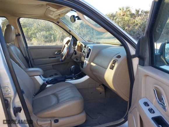 2005 Mercury Mariner Luxury with VIN 4M2CU57115DJ11387, listed as a IAAI auction lot 41267614 with 166,448 mi miles. Bid and sale history available at carsss.com. Image 5.