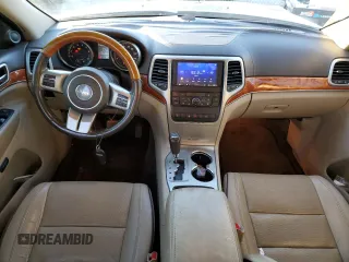2011 Jeep Grand Cherokee Overland with VIN 1J4RS6GGXBC601757, listed as a Copart auction lot 82770454 with 132,109 mi miles and Salvage Title. Bid and sale history available at DreamBid. Image 8.