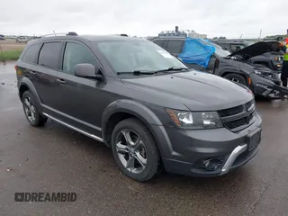 2015 Dodge Journey Crossroad z VIN 3C4PDDGG7FT725717, wystawiony jako IAAI lot #42480505 z przebiegiem 169 584 mil mil oraz . Historia ofert i sprzedaży dostępna na DreamBid. Obrazek 1.