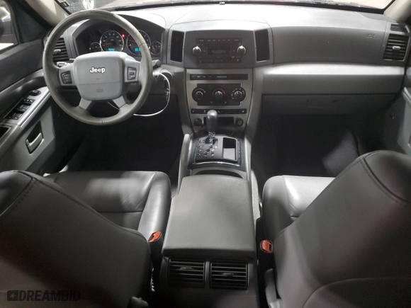 2007 Jeep Grand Cherokee Laredo with VIN 1J8GR48K27C687033, listed as a Copart auction lot 52401165 with 135,146 mi miles and Salvage Title. Bid and sale history available at carsss.com. Image 8.