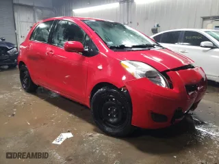 2011 Toyota Yaris with VIN JTDKT4K31B5333148, listed as a Copart auction lot 45413015 with 97,450 mi miles and Salvage Title. Bid and sale history available at carsss.com. Image 4.