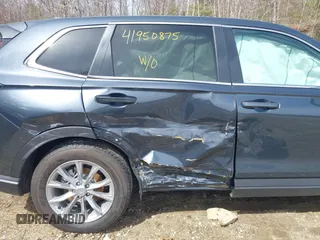 2023 Honda CR-V EX-L with VIN 5J6RS4H75PL008463, listed as a IAAI auction lot 41950875 with 7,125 mi miles and . Bid and sale history available at DreamBid. Image 6.