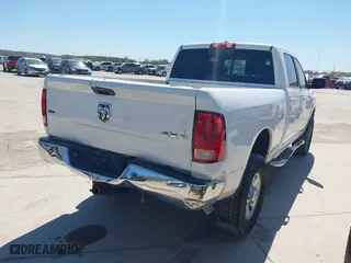 2015 Ram 2500 Big Horn with VIN 3C6TR5DT9FG584320, listed as a IAAI auction lot 41844435 with 214,600 mi miles. Bid and sale history available at carsss.com. Image 4.