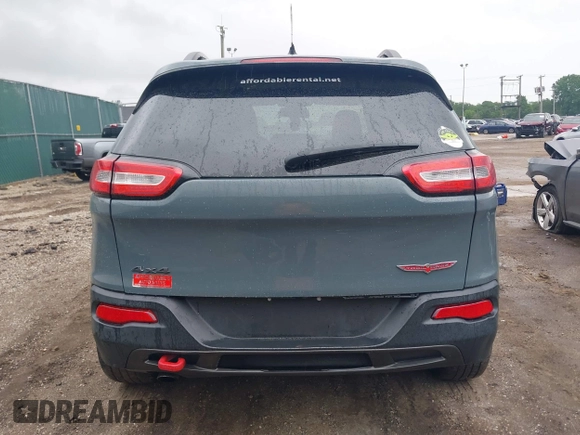2014 Jeep Cherokee Trailhawk with VIN 1C4PJMBB5EW156315, listed as a IAAI auction lot 42426229 with 154,019 mi miles and . Bid and sale history available at DreamBid. Image 17.