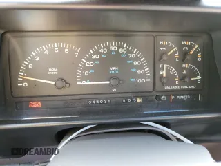 1991 Dodge Caravan z VIN 2B4GK55R6MR136865, wystawiony jako Copart lot #83209824 z przebiegiem 44 931 mil mil oraz Tytuł czysty. Historia ofert i sprzedaży dostępna na DreamBid. Obrazek 9.