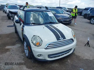 2011 MINI Hardtop with VIN WMWSU3C56BT093448, listed as a IAAI auction lot 42355986 with 175,231 mi miles and . Bid and sale history available at DreamBid. Image 1.