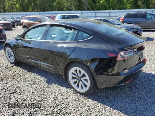 2022 Tesla Model 3 with VIN 5YJ3E1EA5NF102554, listed as a Copart auction lot 53195075 with 62,453 mi miles and Salvage Title. Bid and sale history available at DreamBid. Image 2.