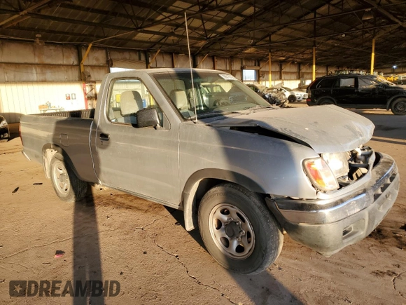 2000 Nissan Frontier XE z VIN 1N6DD21S5YC340513, wystawiony jako Copart lot #89018755 z przebiegiem 237 418 mil mil oraz Szkoda całkowita • Salvage title. Historia ofert i sprzedaży dostępna na DreamBid. Obrazek 4.