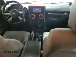 2008 Jeep Wrangler Unlimited Sahara с VIN 1J8GA59108L514034, выставлен на аукционе Copart как лот 58812215 с пробегом 191 800 миль миль и Списание • Salvage title. История ставок и продаж доступна на DreamBid. Изображение 8.