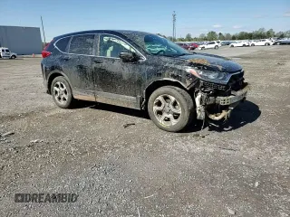 2018 Honda CR-V EX with VIN 7FARW2H54JE012712, listed as a Copart auction lot 52256715 with 69,767 mi miles and Salvage Title. Bid and sale history available at DreamBid. Image 12.