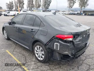 2023 Toyota Corolla Hybrid LE with VIN JTDBCMFE3P3020309, listed as a IAAI auction lot 41785944 with 19,617 mi miles. Bid and sale history available at carsss.com. Image 3.