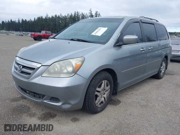 2007 Honda Odyssey EX-L with VIN 5FNRL38777B075985, listed as a IAAI auction lot 42083450 with 127,622 mi miles. Bid and sale history available at carsss.com. Image 2.
