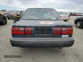 1991 Toyota Corolla z VIN 1NXAE94A0MZ186484, wystawiony jako Copart lot #76421584 z przebiegiem 201 018 mil mil oraz Czysty tytuł • Clean title. Historia ofert i sprzedaży dostępna na DreamBid. Obrazek 6.