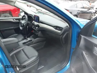 2021 Ford Escape SEL z VIN 1FMCU9H6XMUA63812, wystawiony jako IAAI lot #42418390 z przebiegiem 88 263 mil mil oraz . Historia ofert i sprzedaży dostępna na DreamBid. Obrazek 5.