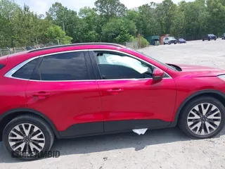 2020 Ford Escape Titanium z VIN 1FMCU9J92LUA39457, wystawiony jako IAAI lot #42222441 z przebiegiem 107 148 mil mil oraz . Historia ofert i sprzedaży dostępna na DreamBid. Obrazek 13.