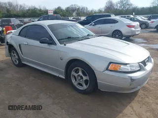 2004 Ford Mustang Standard z VIN 1FAFP40604F211340, wystawiony jako IAAI lot #42071445 z przebiegiem Nie podano mil oraz . Historia ofert i sprzedaży dostępna na DreamBid. Obrazek 1.