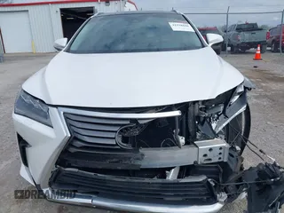 2018 Lexus RX 350 with VIN 2T2BZMCA8JC158132, listed as a IAAI auction lot 41938606 with 99,613 mi miles and . Bid and sale history available at DreamBid. Image 12.