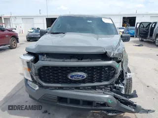2021 Ford F-150 XL with VIN 1FTEW1CP3MFA80786, listed as a IAAI auction lot 42061952 with 32,071 mi miles. Bid and sale history available at carsss.com. Image 12.