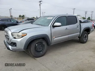 2017 Toyota Tacoma SR5 with VIN 3TMCZ5AN4HM093303, listed as a Copart auction lot 63341645 with 129,304 mi miles and Salvage title. Bid and sale history available at DreamBid. Image 1.